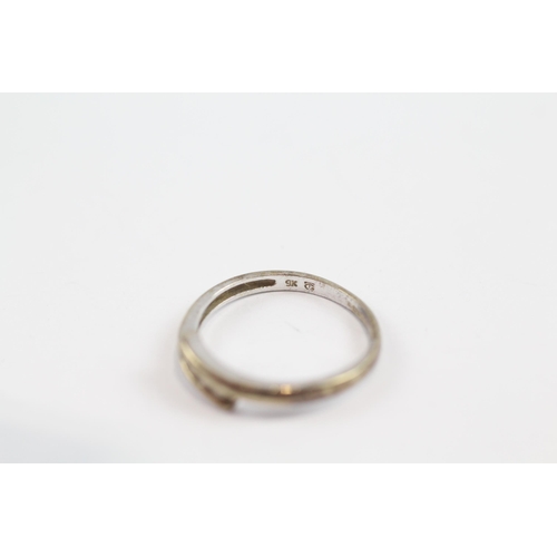 134 - 9ct Gold Diamond Four Stone Bypass Ring (1.5g) Size  L