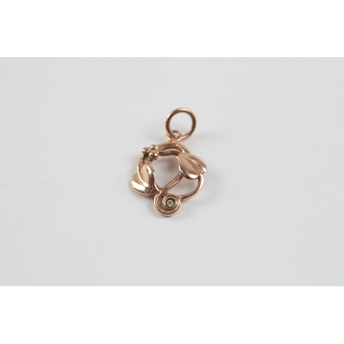 144 - 9ct Gold Diamond Openwork Pendant By Clogau (1G)