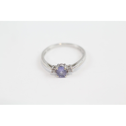 149 - 9ct White Gold Diamond & Tanzanite Three Stone Ring (1.2G) Size  L