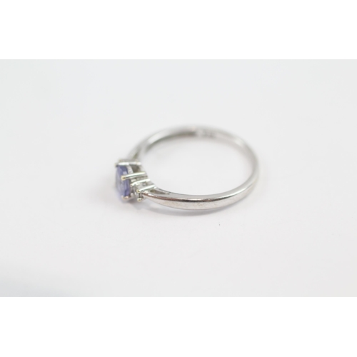 149 - 9ct White Gold Diamond & Tanzanite Three Stone Ring (1.2G) Size  L