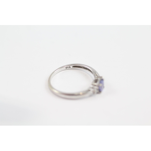 149 - 9ct White Gold Diamond & Tanzanite Three Stone Ring (1.2G) Size  L