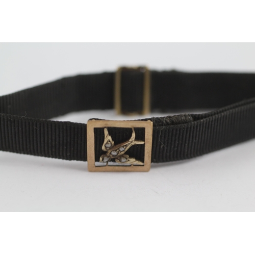 167 - 9ct Gold Victorian Seed Pearl Set Swallow Slider Pendant And Clasp On A Grossgrain Bracelet (2.6g)