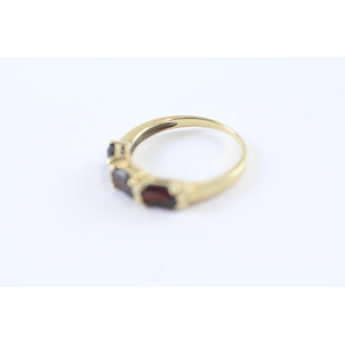 243 - 14ct Gold Garnet Three Stone Ring (2.4g) Size  L 1/2