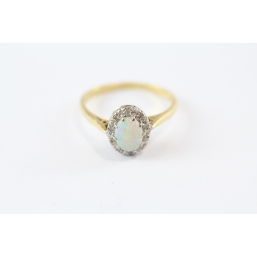 51 - 18ct Gold White Opal & White Gemstone Oval Halo Ring (2.7g) Size  N