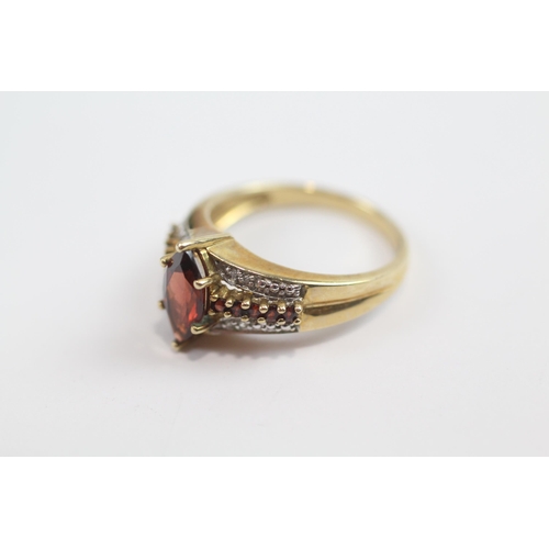 62 - 9ct Gold Diamond And Garnet Accented Marquise Cut Garnet Set Dress Ring (3.5g) Size  N