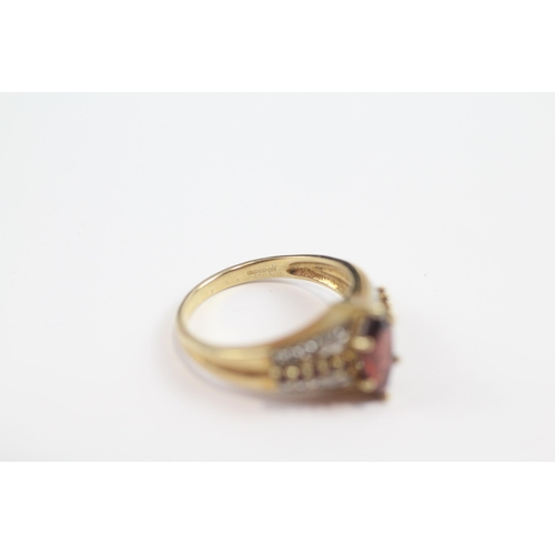 62 - 9ct Gold Diamond And Garnet Accented Marquise Cut Garnet Set Dress Ring (3.5g) Size  N