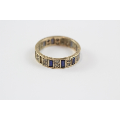 72 - 9ct Gold Synthetic Sapphire & White Gemstone Band Ring (3.9g) Size  S