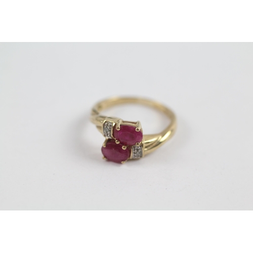 77 - 9ct Gold Vintage Diamond Accented Synthetic Ruby Bypass Ring (2.2g) Size  J 1/2