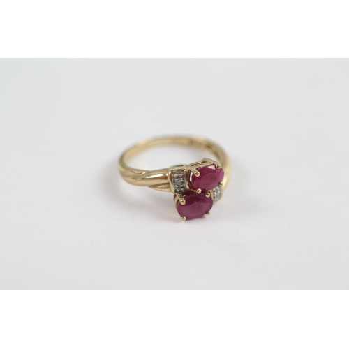 77 - 9ct Gold Vintage Diamond Accented Synthetic Ruby Bypass Ring (2.2g) Size  J 1/2