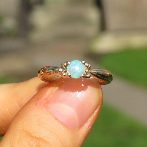 143 - 9ct Gold White Opal Single Stone Ring (2.8g) Size  N
