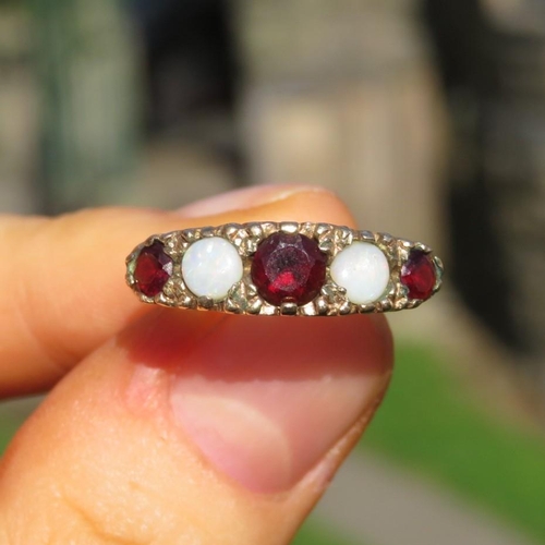 154 - 9ct Gold Garnet & White Opal Five Stone Ring (3.1g) Size  O