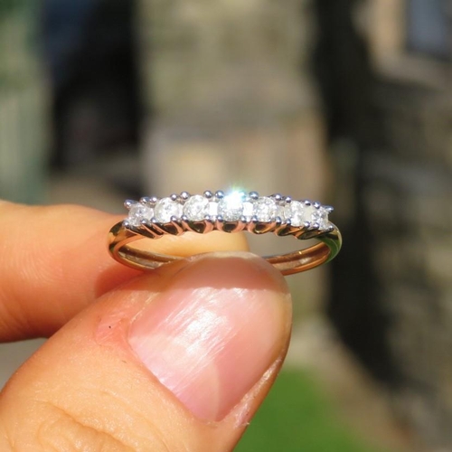 158 - 9ct Gold Diamond Seven Stone Ring (1.5G) Size  R 1/2