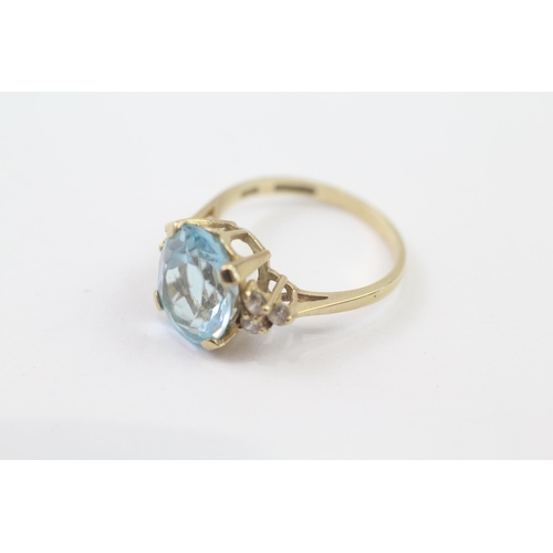 115 - 9ct Gold Blue Topaz & Cubic Zirconia Dress Ring (3.4g) Size  O