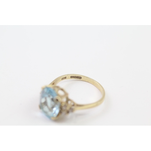 115 - 9ct Gold Blue Topaz & Cubic Zirconia Dress Ring (3.4g) Size  O