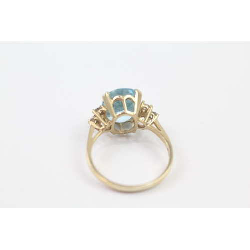 115 - 9ct Gold Blue Topaz & Cubic Zirconia Dress Ring (3.4g) Size  O