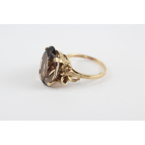 129 - 9ct Gold Smoky Quartz Single Stone Cocktail Ring (5.9g) Size  P