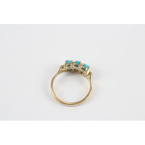 142 - 9ct Gold Faux Turquoise Trilogy Ring (2.4g) Size  L 1/2