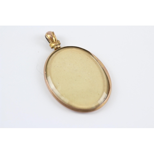 187 - 9ct Gold Antique Victorian Oval Double Sided Locket Pendant (8.3g)