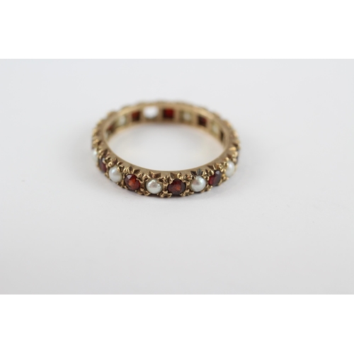 195 - 9ct Gold Garnet & Pearl Full Eternity Ring (2.6g) Size  O