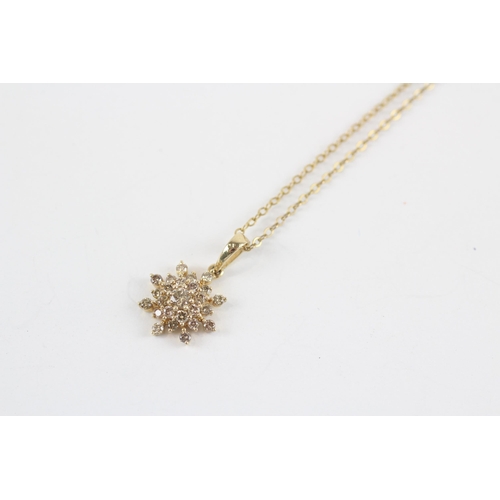 197 - 9ct Gold Diamond Floral Cluster Pendant Necklace (2g)