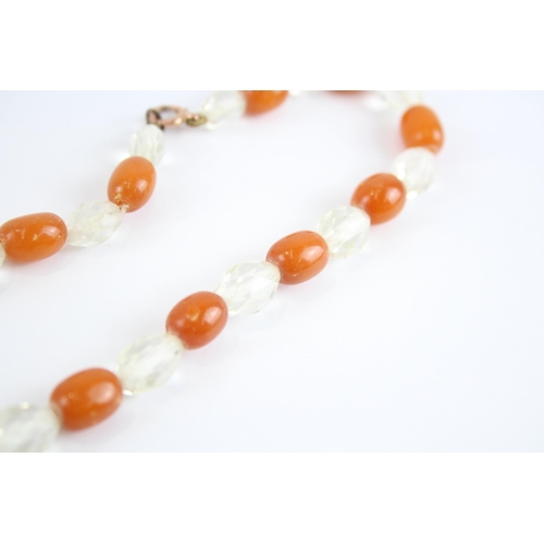 198 - 9ct Gold Clasp Antique Butterscotch Amber & Paste Single Strand Necklace (33.3g)