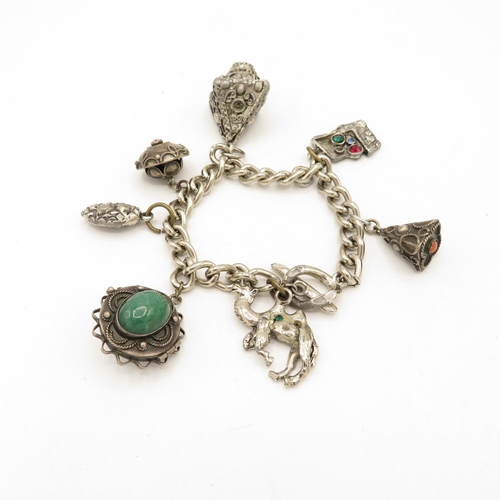 218 - Eastern tradition charm bracelet including gemstone (85g)