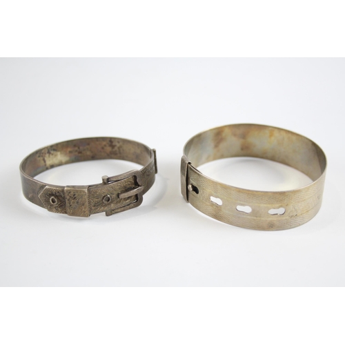 231 - Two silver buckle design bangles (63g)