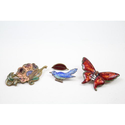 235 - Four cold painted enamel brooches (24g)