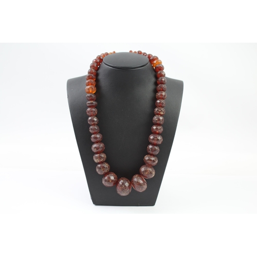 243 - Antique faceted Amber graduated necklace (91g)