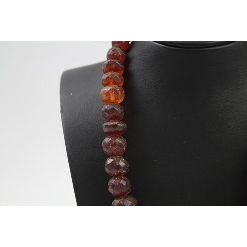 243 - Antique faceted Amber graduated necklace (91g)