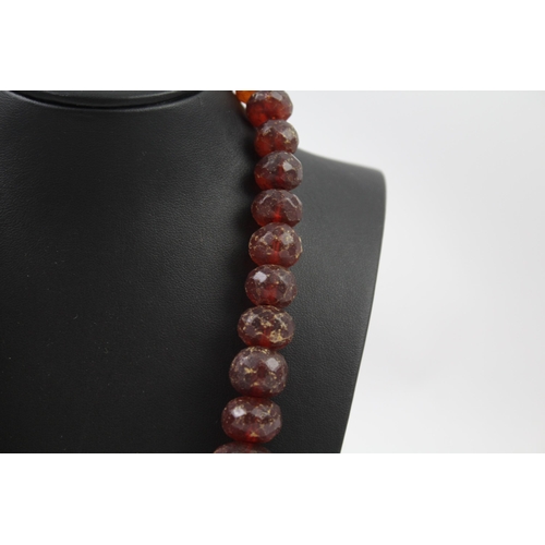 243 - Antique faceted Amber graduated necklace (91g)