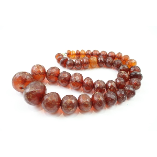 243 - Antique faceted Amber graduated necklace (91g)