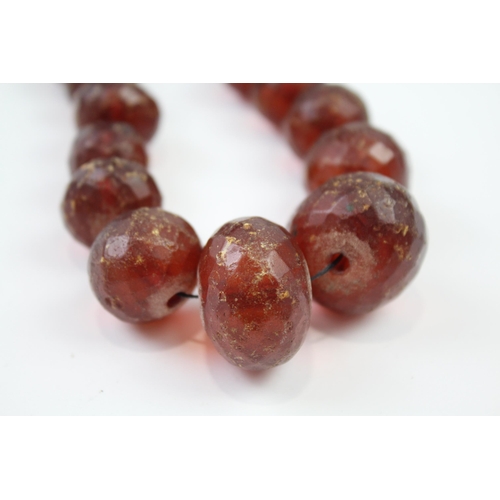 243 - Antique faceted Amber graduated necklace (91g)