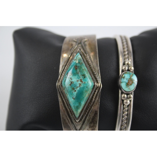 246 - Two silver Navajo Turquoise bangles including Albert Jake (54g)