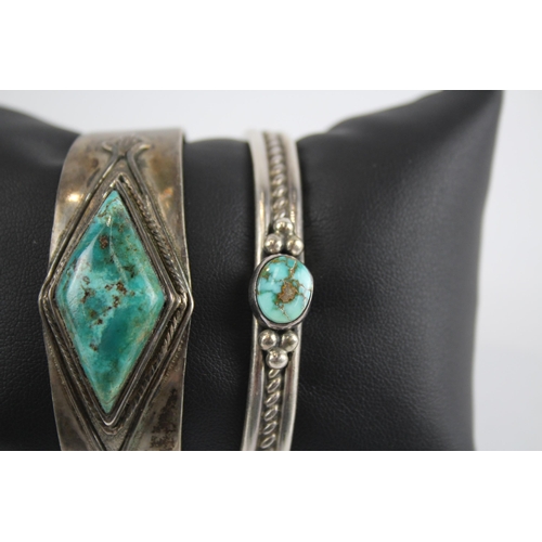 246 - Two silver Navajo Turquoise bangles including Albert Jake (54g)