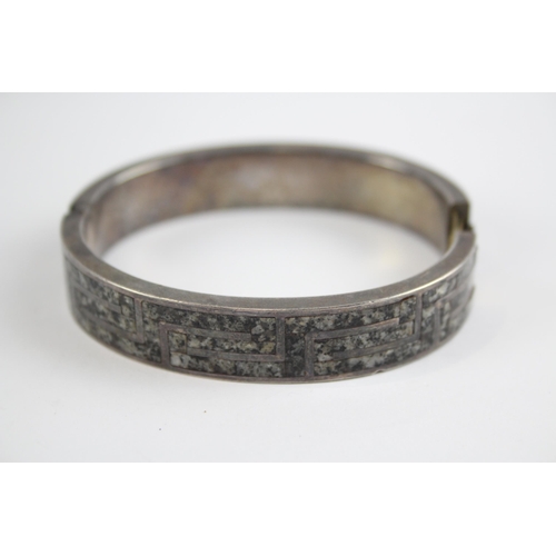 257 - Silver antique granite inlay bangle by M Rettie and Sons (48g)