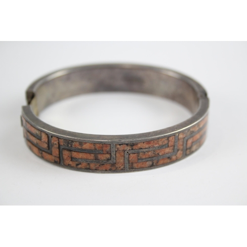 257 - Silver antique granite inlay bangle by M Rettie and Sons (48g)