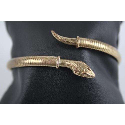 260 - 9ct rolled gold wrap around snake bangle (17g)