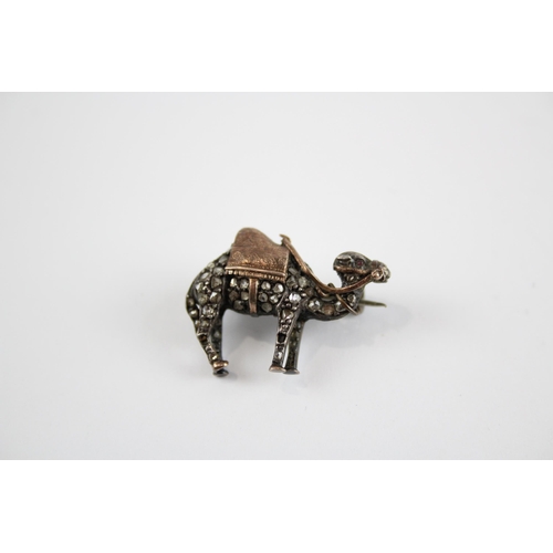 268 - Silver antique camel brooch set with rose cut Diamonds (5g)