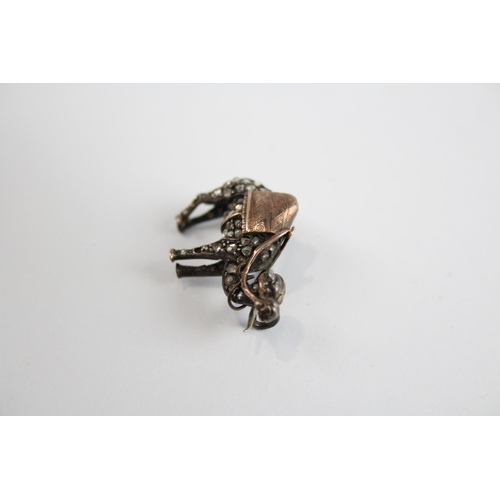 268 - Silver antique camel brooch set with rose cut Diamonds (5g)