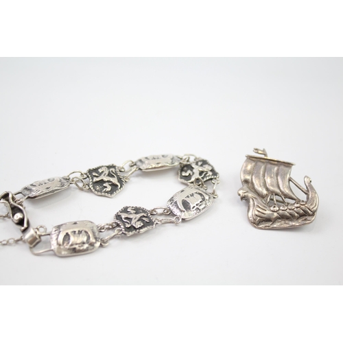 272 - A collection of silver Viking ship design jewellery (34g)