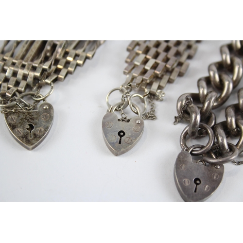 290 - Three silver bracelets with heart padlock clasps (93g)