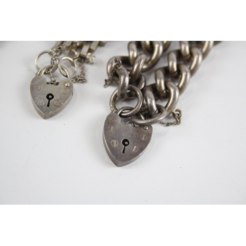 290 - Three silver bracelets with heart padlock clasps (93g)