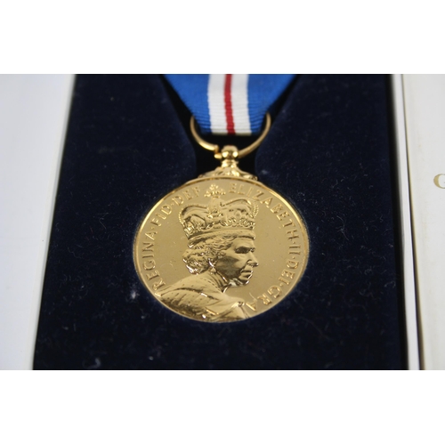 302 - Boxed ER.II Queens Golden Jubilee Medal With C.O.A