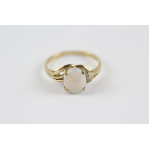 7 - 9ct Gold White Opal Single Stone Ring With Diamond Accent (2g) Size  N