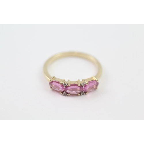 90 - 9ct Gold Pink Sapphire Three Stone Ring With Diamond Spacers (2.1g) Size  O