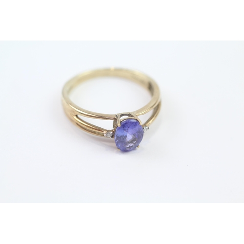 91 - 9ct Gold Tanzanite Single Stone Ring With Diamond Sides & Split Shank (2.7g) Size  S