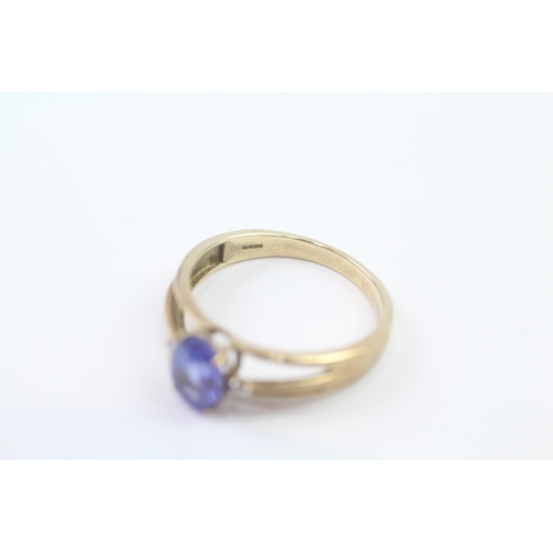 91 - 9ct Gold Tanzanite Single Stone Ring With Diamond Sides & Split Shank (2.7g) Size  S