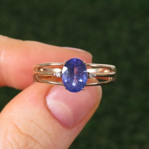 91 - 9ct Gold Tanzanite Single Stone Ring With Diamond Sides & Split Shank (2.7g) Size  S