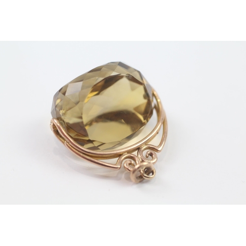 126 - 9ct Gold Victorian Citrine Set Spinner Fob (16.6g)